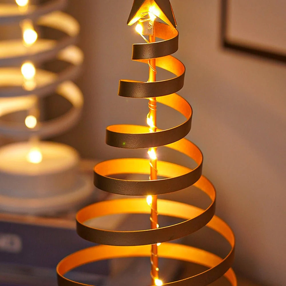Decorative spiral light fixture with warm glow on a blurred background