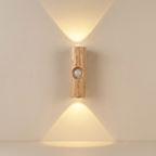 Wooden wall light fixture on a beige wall