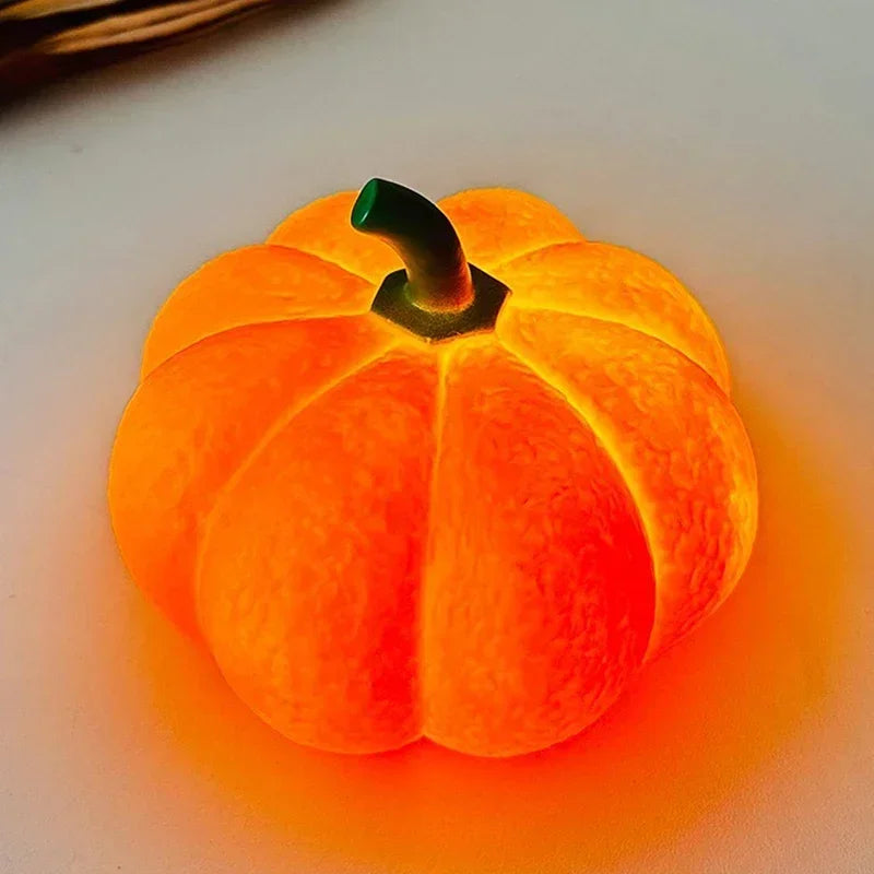 Glowing orange pumpkin on a light background