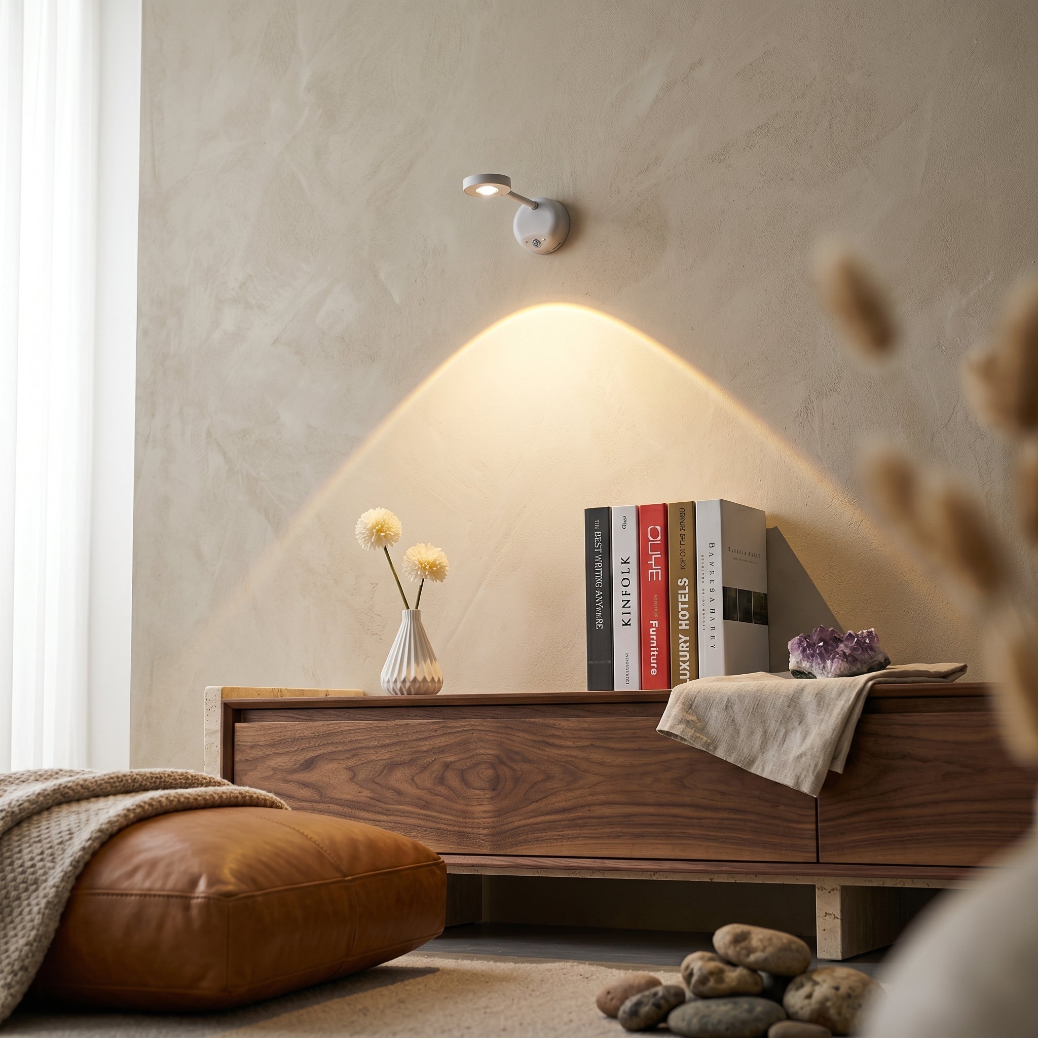 Wooden console table with decorative items in a room with soft lighting