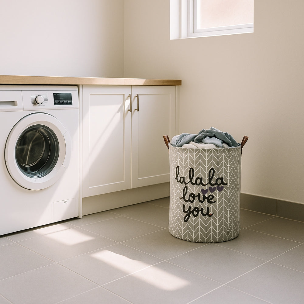 Laundry basket with clothes next to a washing machine in a laundry room.