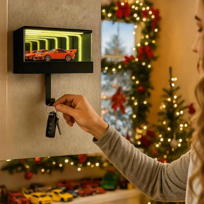 Person hanging keys on a wall-mounted key holder with Christmas decorations in the background