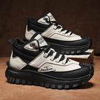 Black and white sneakers with 'From Fashion' branding on a brown surface.