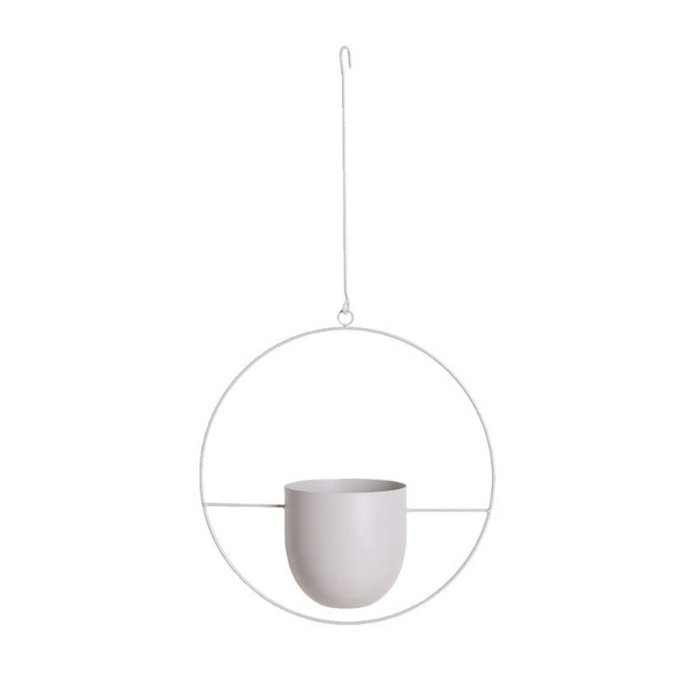 A minimalist white hanging planter with a matte ceramic cup suspended inside a thin circular metal frame on a solid white background.