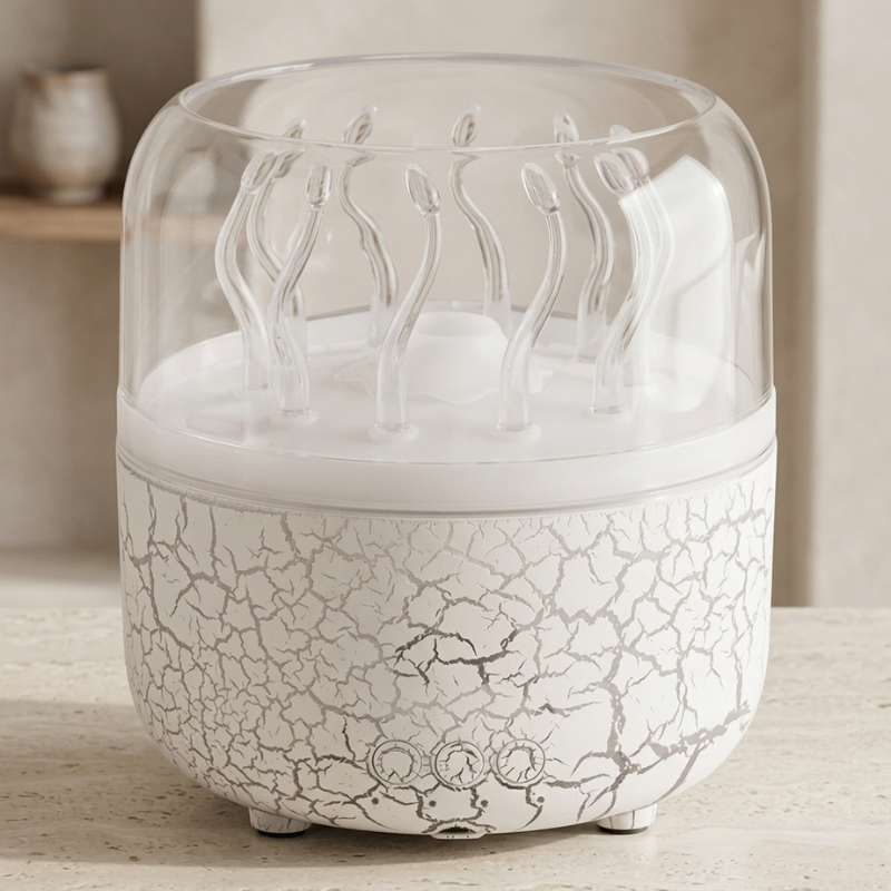 White ceramic diffuser with cracked texture on a wooden surface