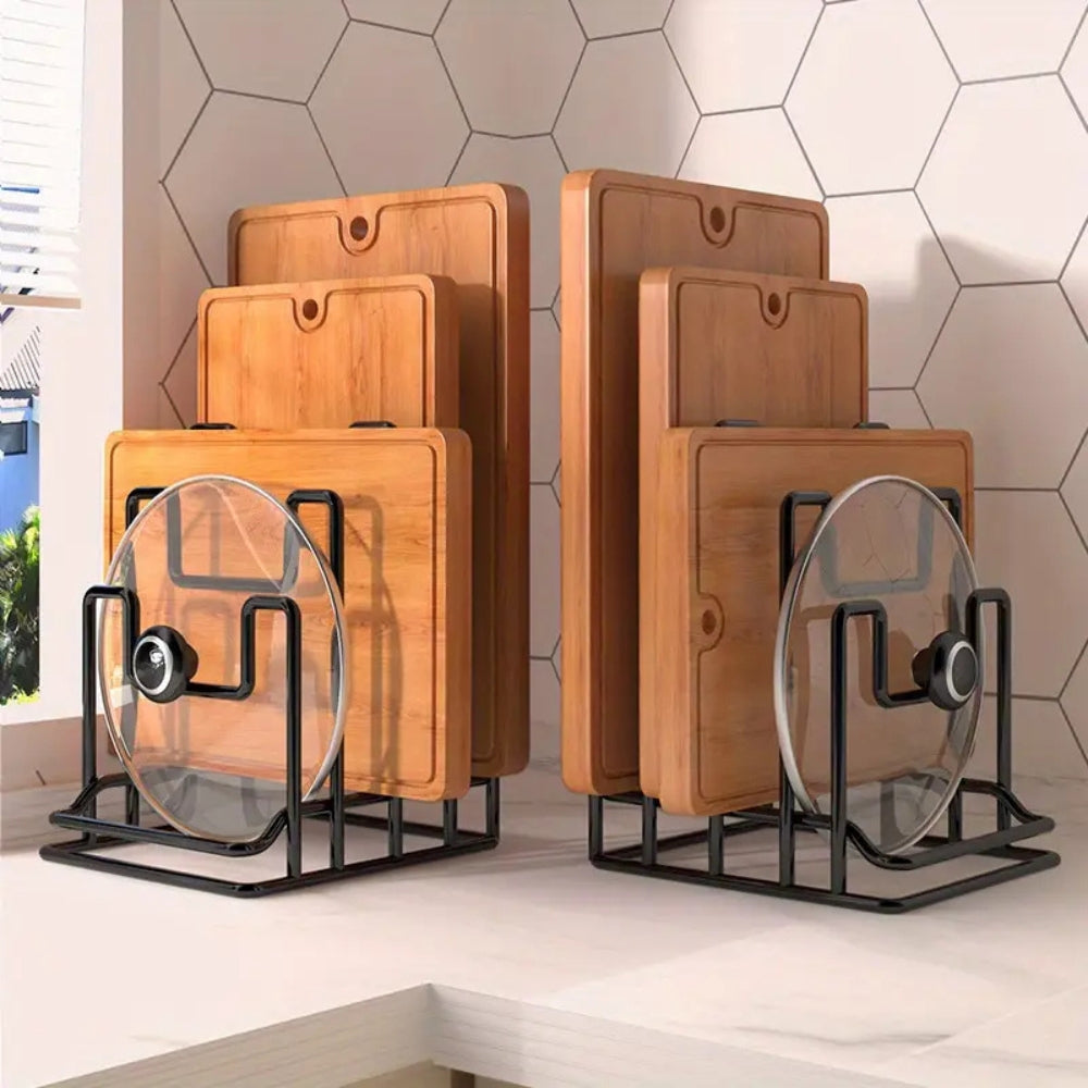 Set of wooden cutting boards with glass lids on metal stands against a tiled wall.