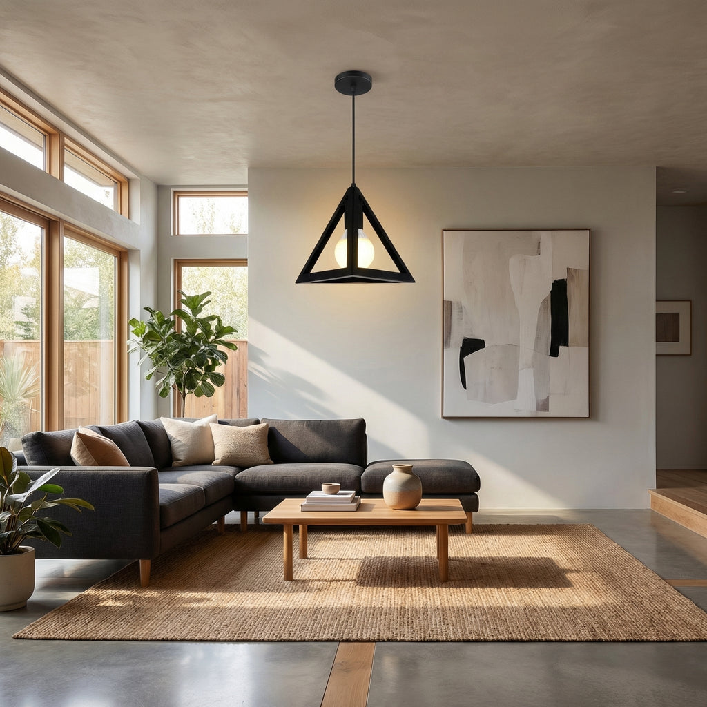 Modern living room with a sectional sofa, coffee table, and abstract art on the wall.