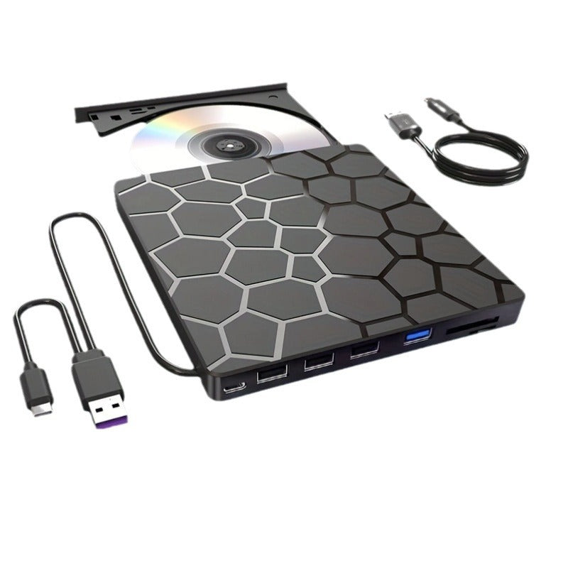 Honeycomb-patterned external USB hub with cables on a white background