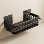 Black wall-mounted shower caddy on a beige wall