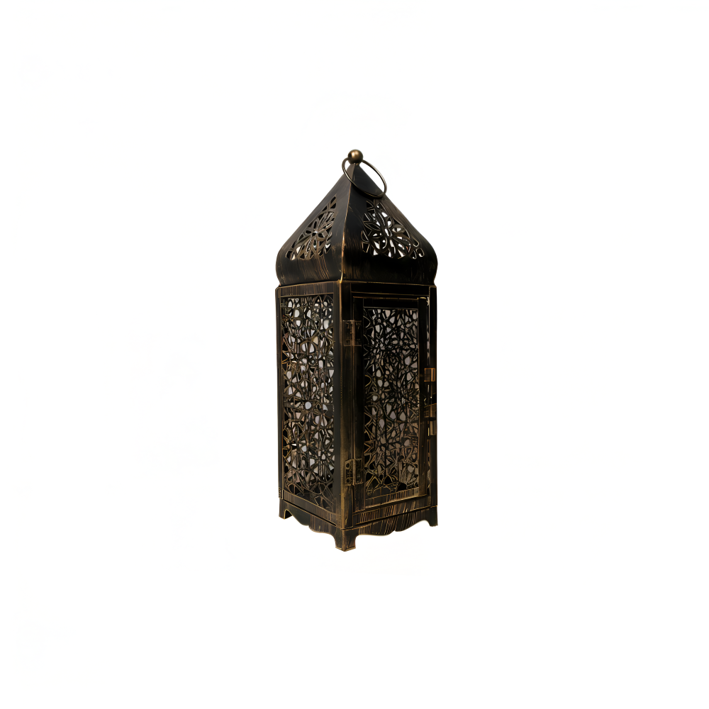 A tall, ornate metal lantern with intricate cutout patterns on its sides and a pointed top, finished in a dark bronze or black color with subtle warm metallic highlights, shown against a plain white background.