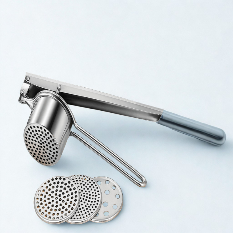 Metallic garlic press with three interchangeable discs on a light blue background