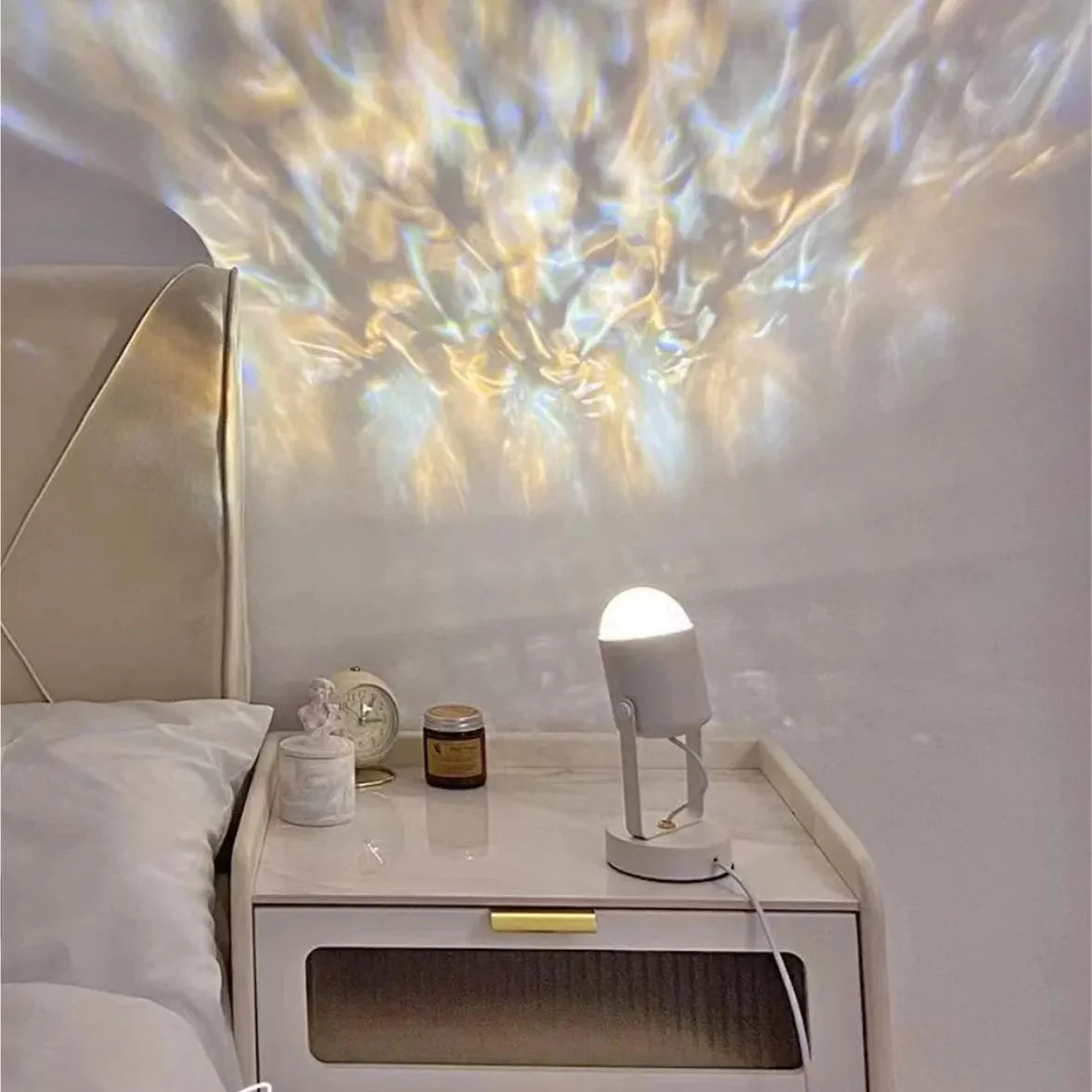 Modern nightstand with decorative lamp and nightlight projection on wall