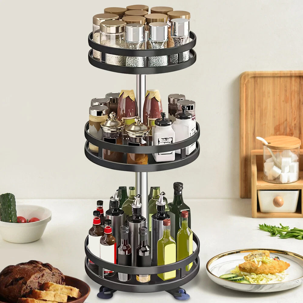 Three-tiered spice rack with various bottles on a kitchen counter