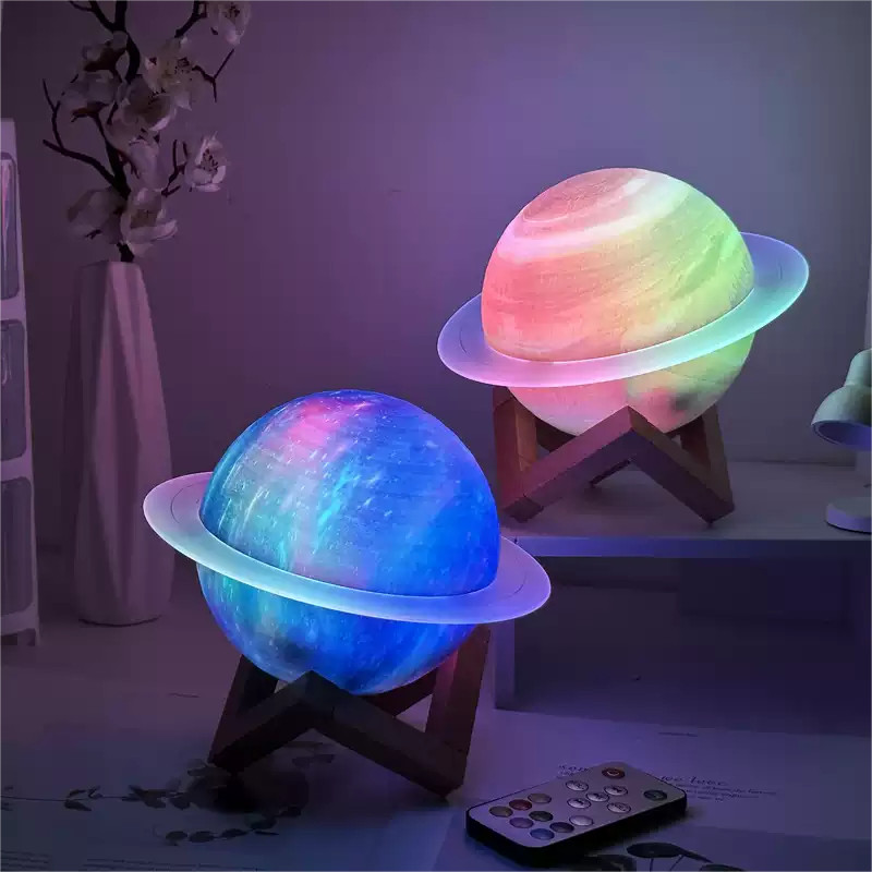 Two colorful planet-shaped lamps on stands in a room setting.