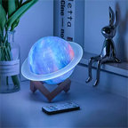 Colorful planet-shaped lamp on a stand with a remote control on a shelf.