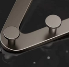 Metallic faucet handle on a dark background
