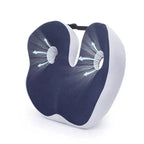 Navy blue and white neck pillow on a white background