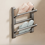 Wall-mounted shoe rack with two pairs of shoes on a beige background