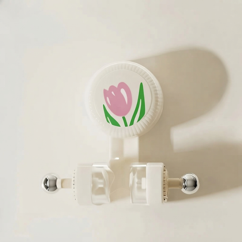 Retractable badge holder with a pink tulip design on a white background