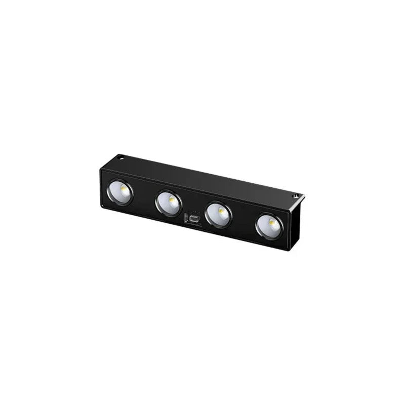 Black rectangular light fixture with four LED lights and dimensions on a white background