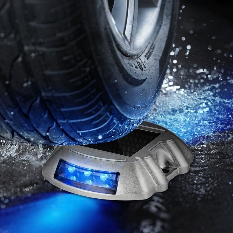 Solar-powered LED light on a wet tire with blue light emission