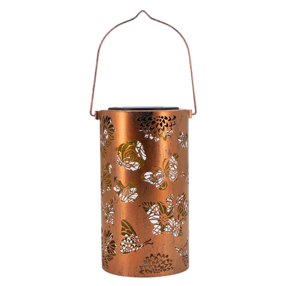 Copper-colored lantern with floral patterns on a white background