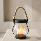 Solar lantern with flame effect on a neutral background