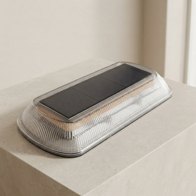 Rectangular solar light on a beige surface with a neutral background