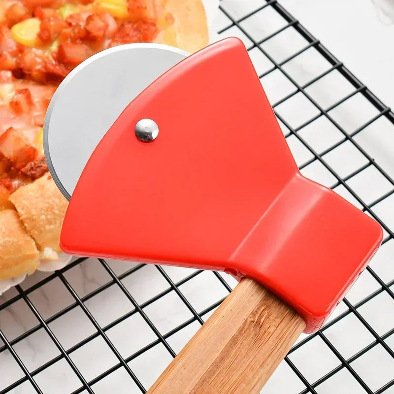 Red pizza cutter with wooden handle on a metal cooling rack with a pizza in the background