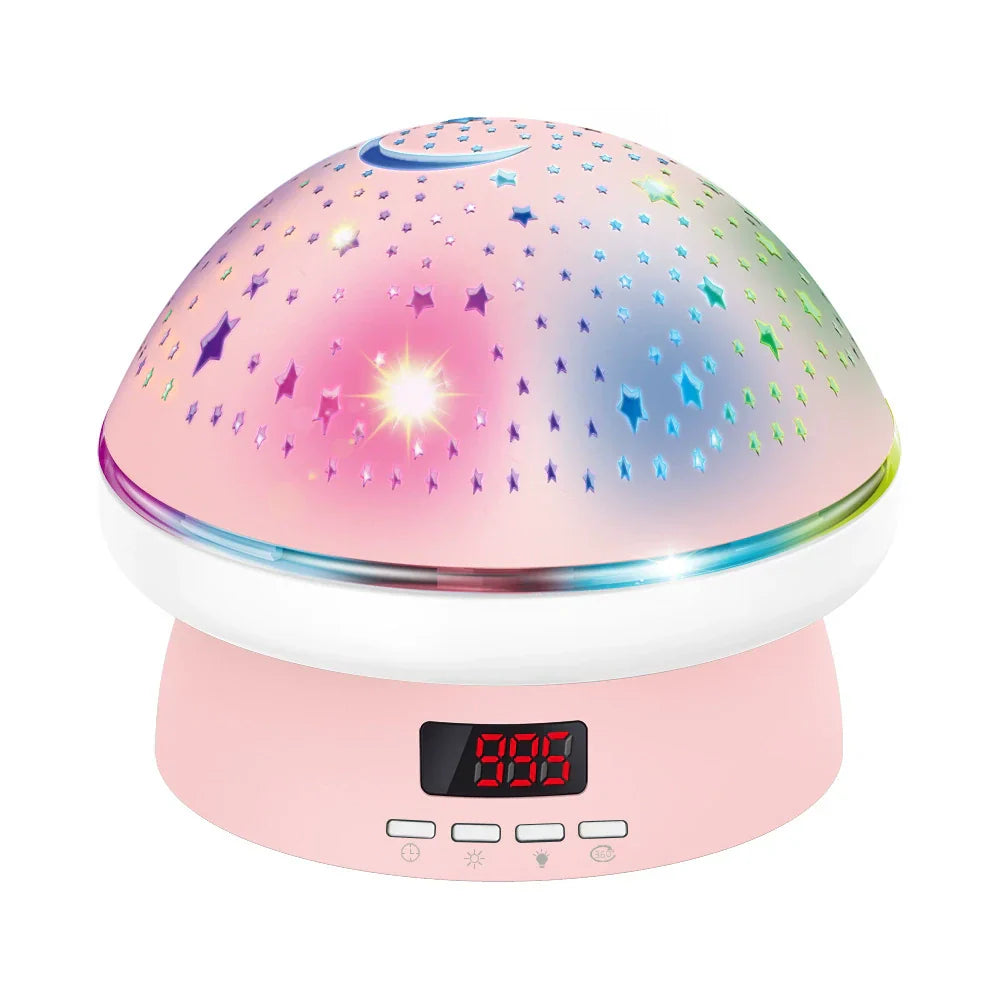 Pink night light projector with star patterns on a white background