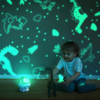Child playing with a dinosaur toy in front of a wall with dinosaur decals and a glowing night light.