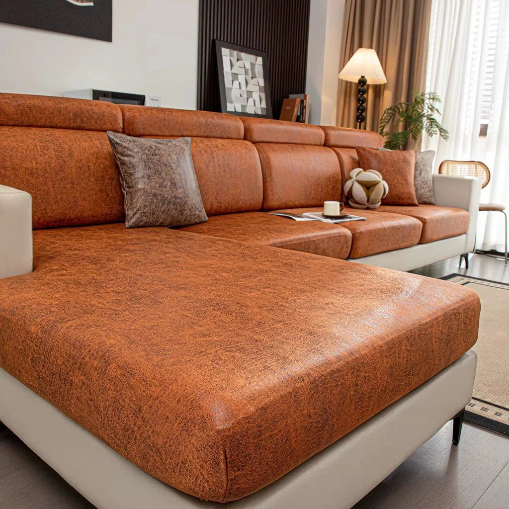 Brown sectional sofa in a living room setting with decor elements.