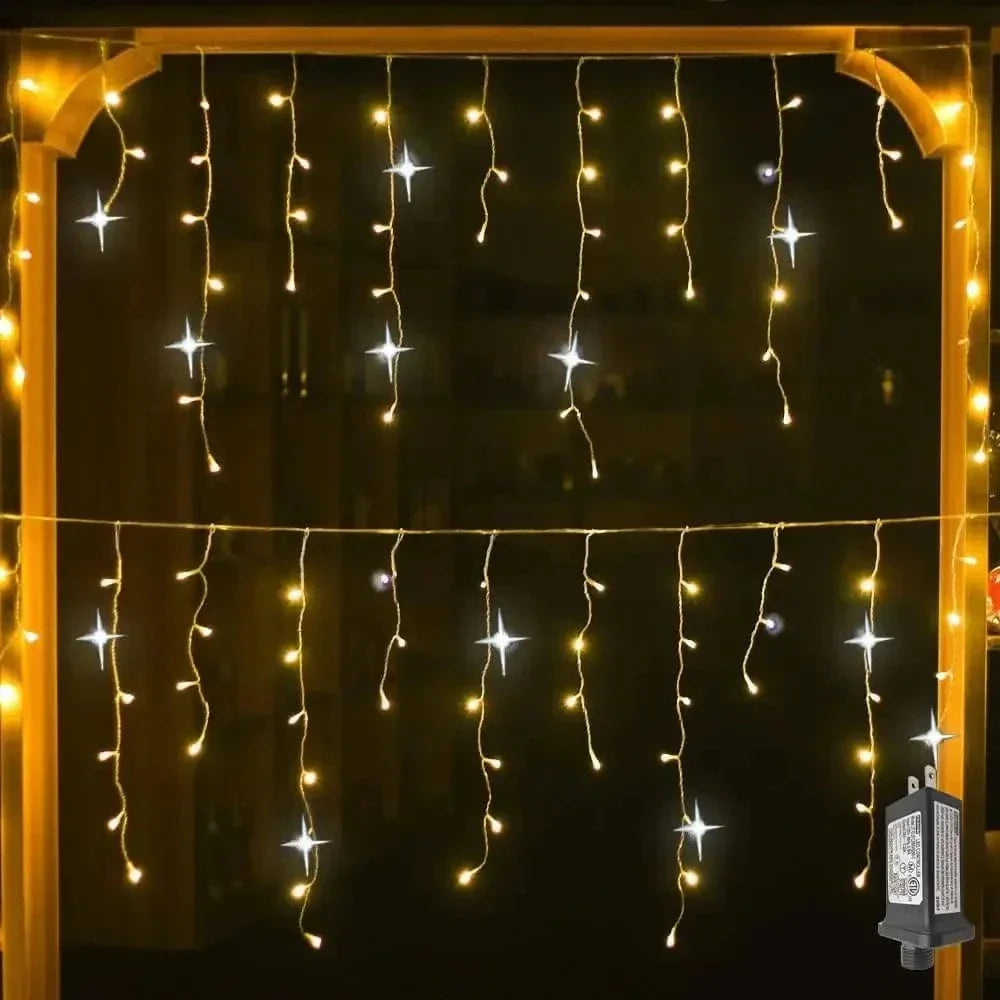 String lights hanging against a dark background with a power adapter on a wooden frame.