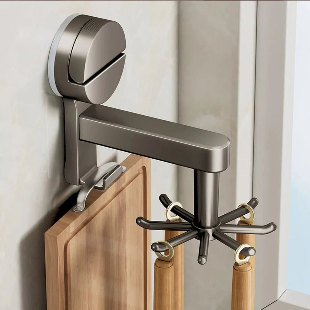 Wall-mounted coat rack with hooks and a cutting board on a neutral background
