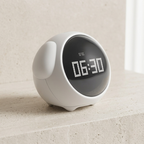 Digital clock displaying the time on a light-colored surface