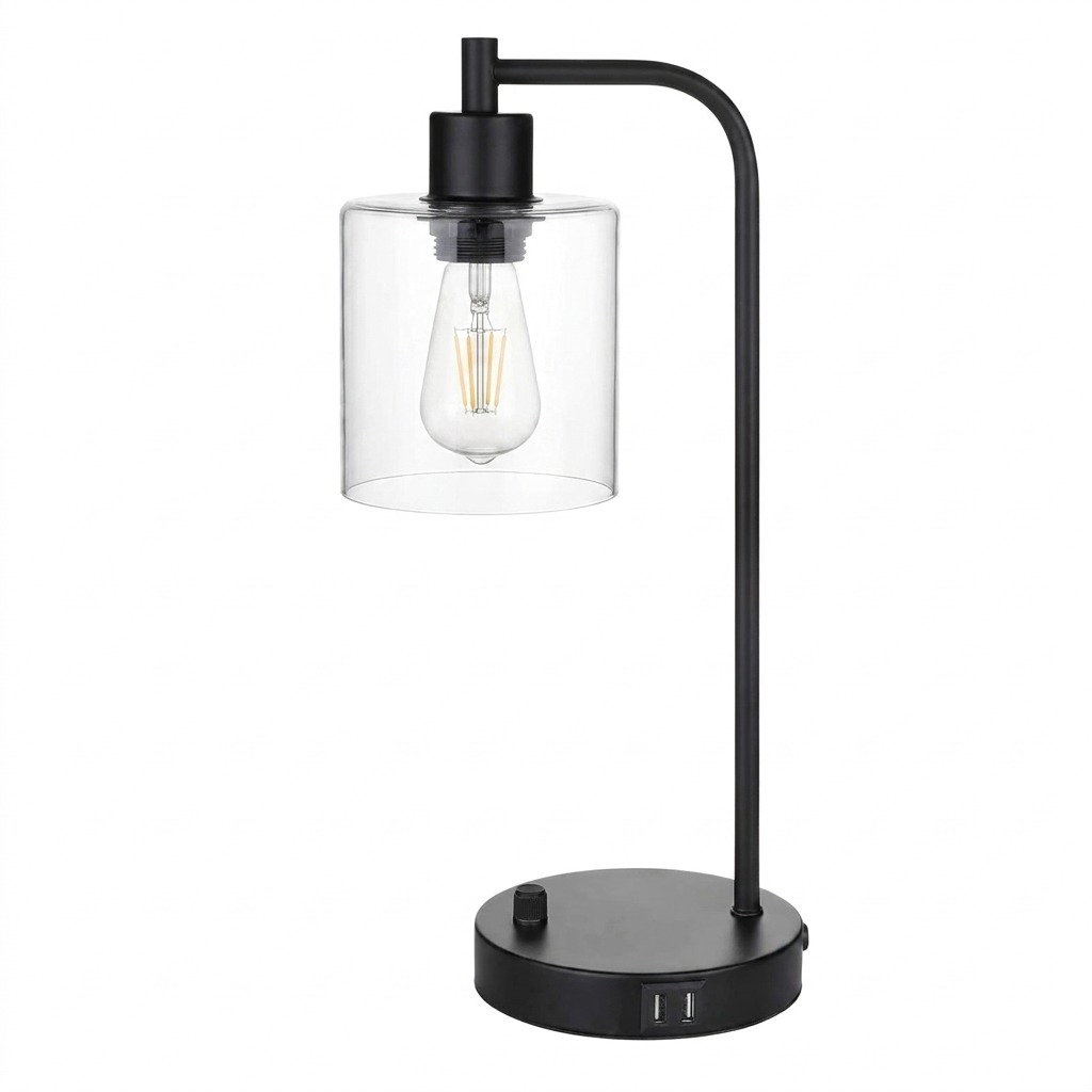 Modern black table lamp with clear glass shade on a white background