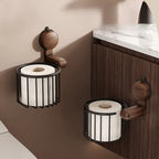 Two wall-mounted toilet paper holders with toilet paper rolls in a bathroom setting.