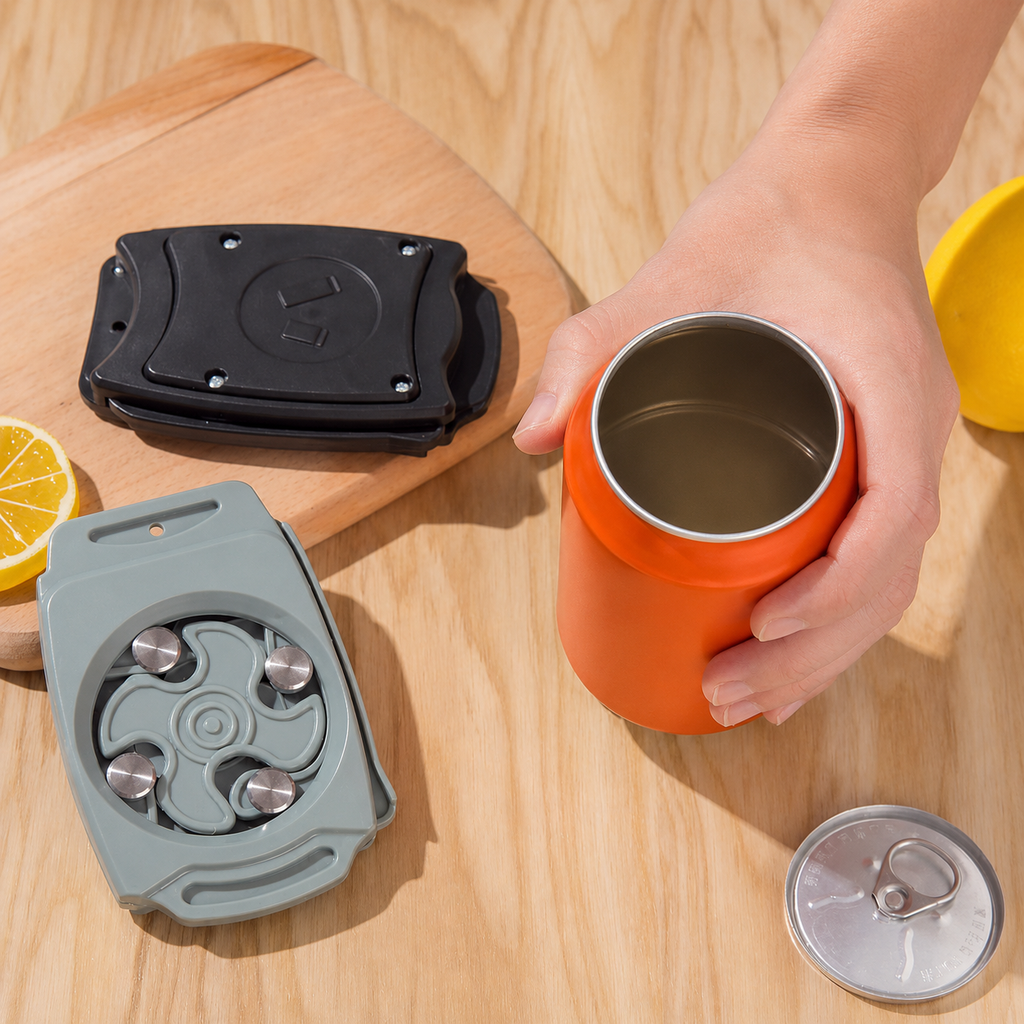Orange mug with a black and gray lid on a wooden surface