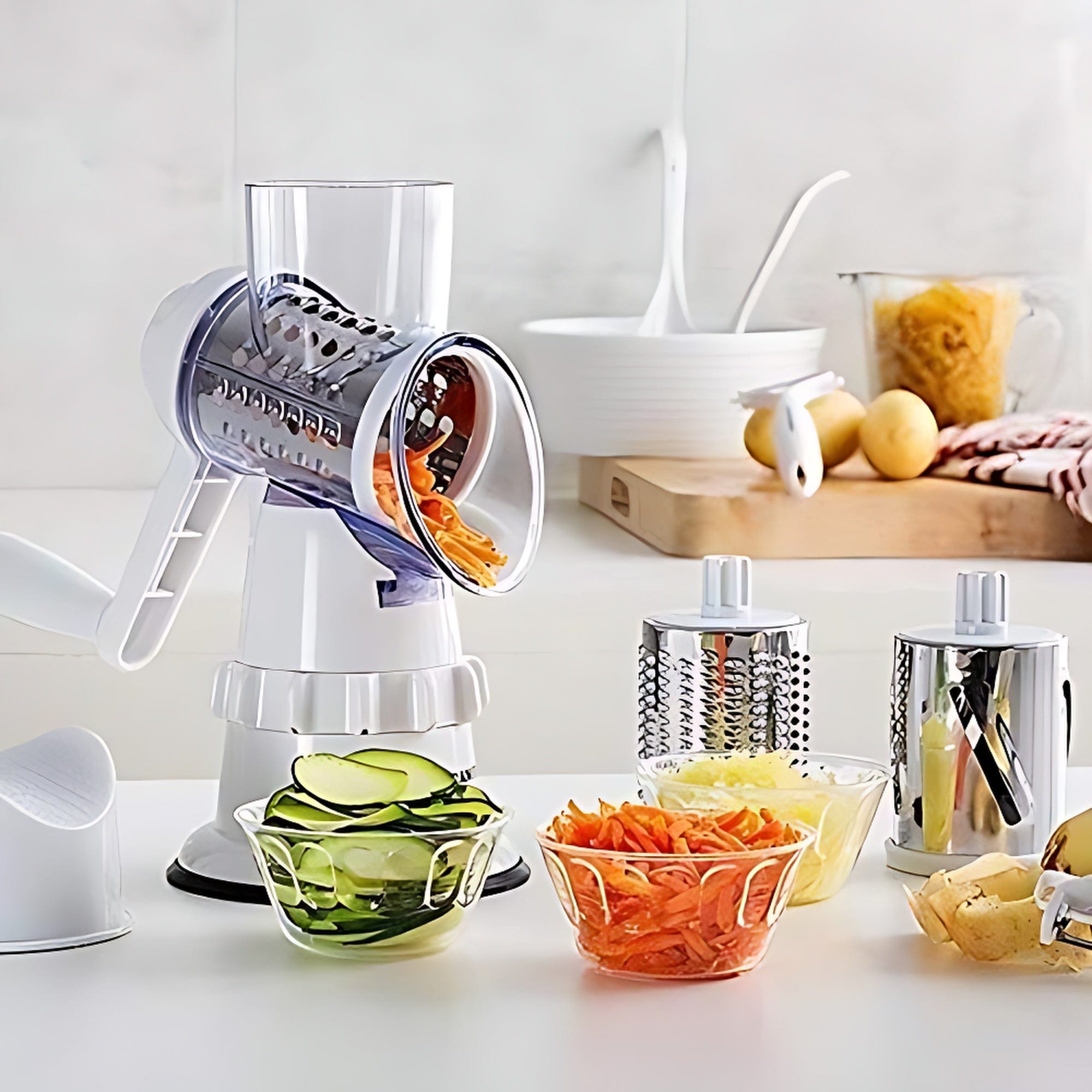 Kitchen slicer with sliced vegetables on a white countertop