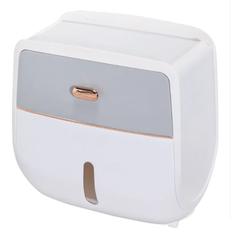 White and gray electronic device with a rose gold accent on a white background