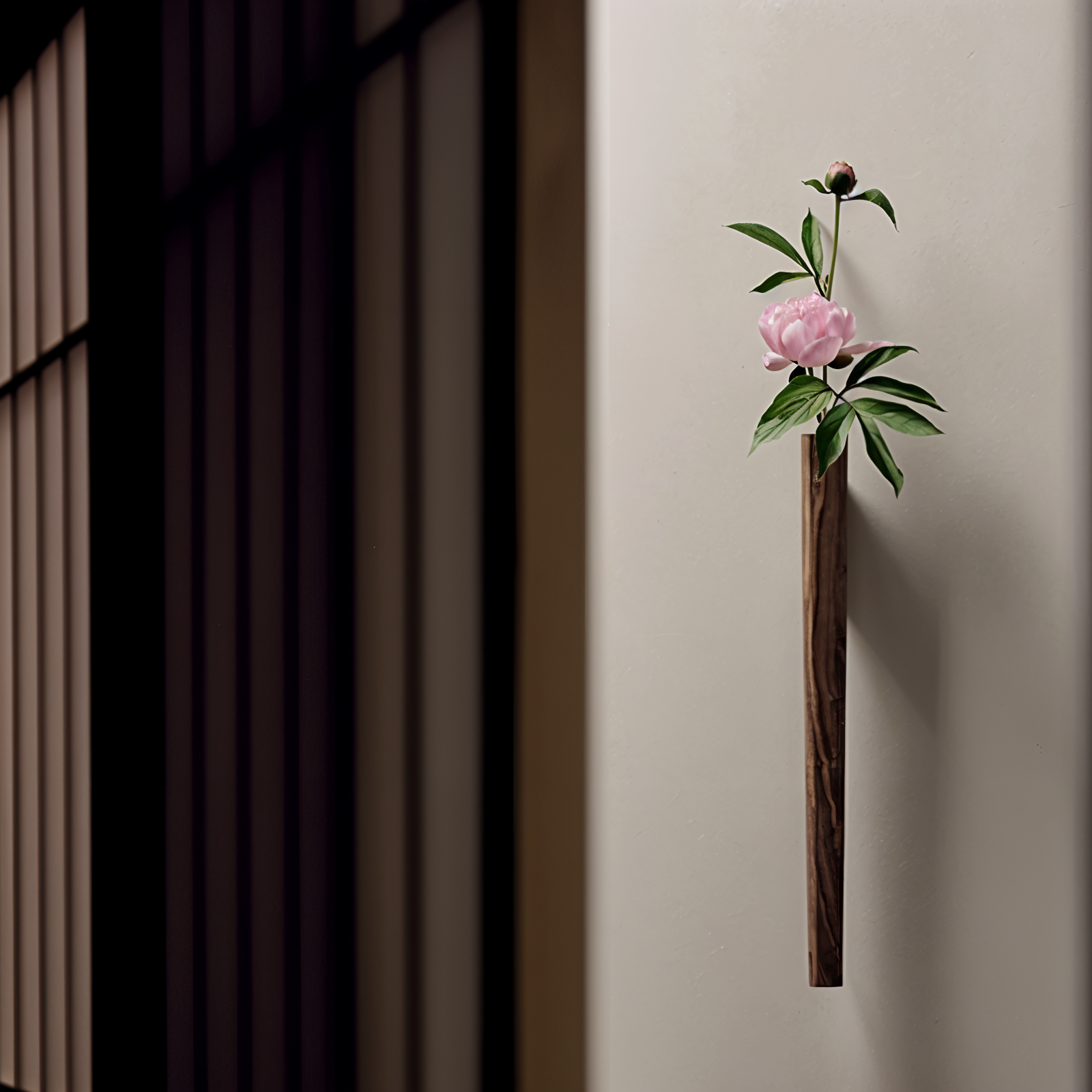 Pink flower in a wooden vase against a neutral wall