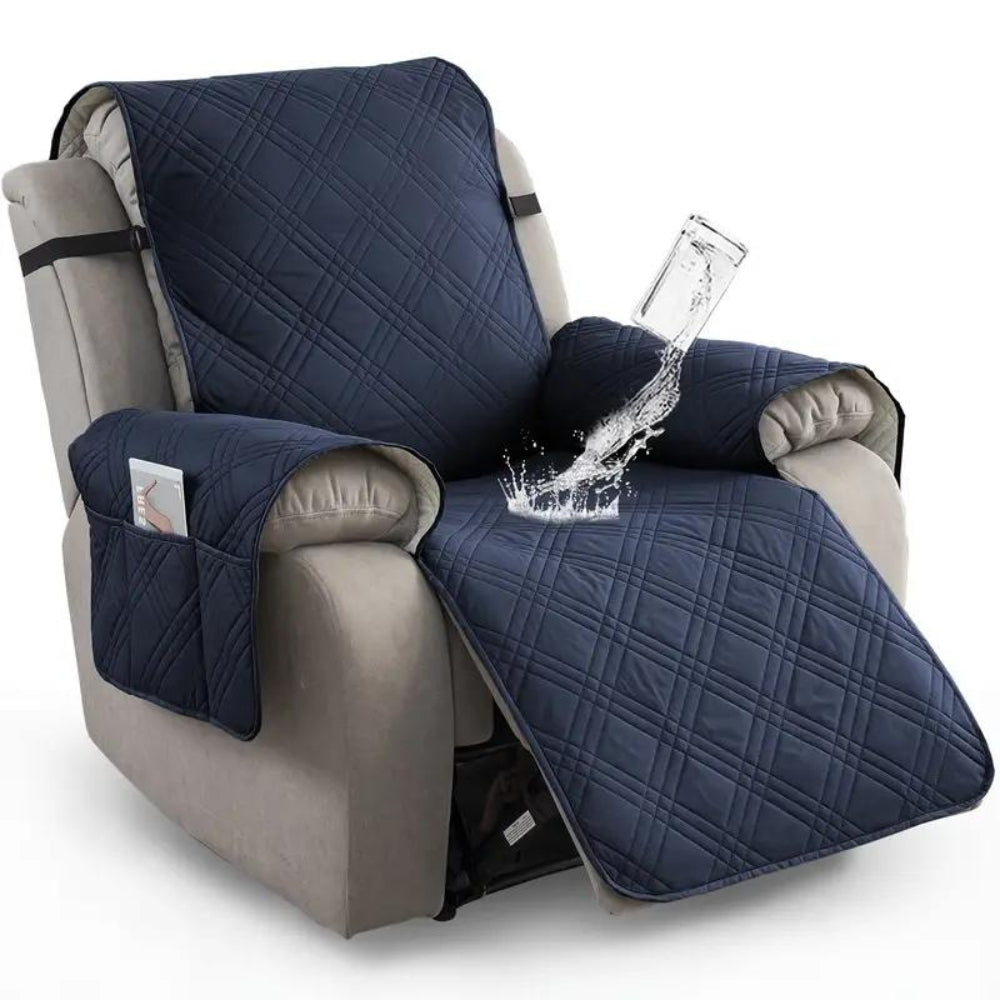 Navy blue quilted chair cover on a beige recliner with water being poured onto it.