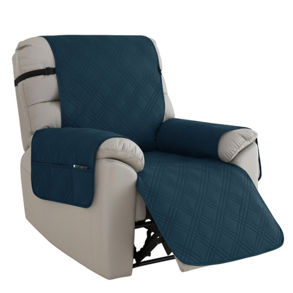Beige recliner chair with blue quilted cover on a white background
