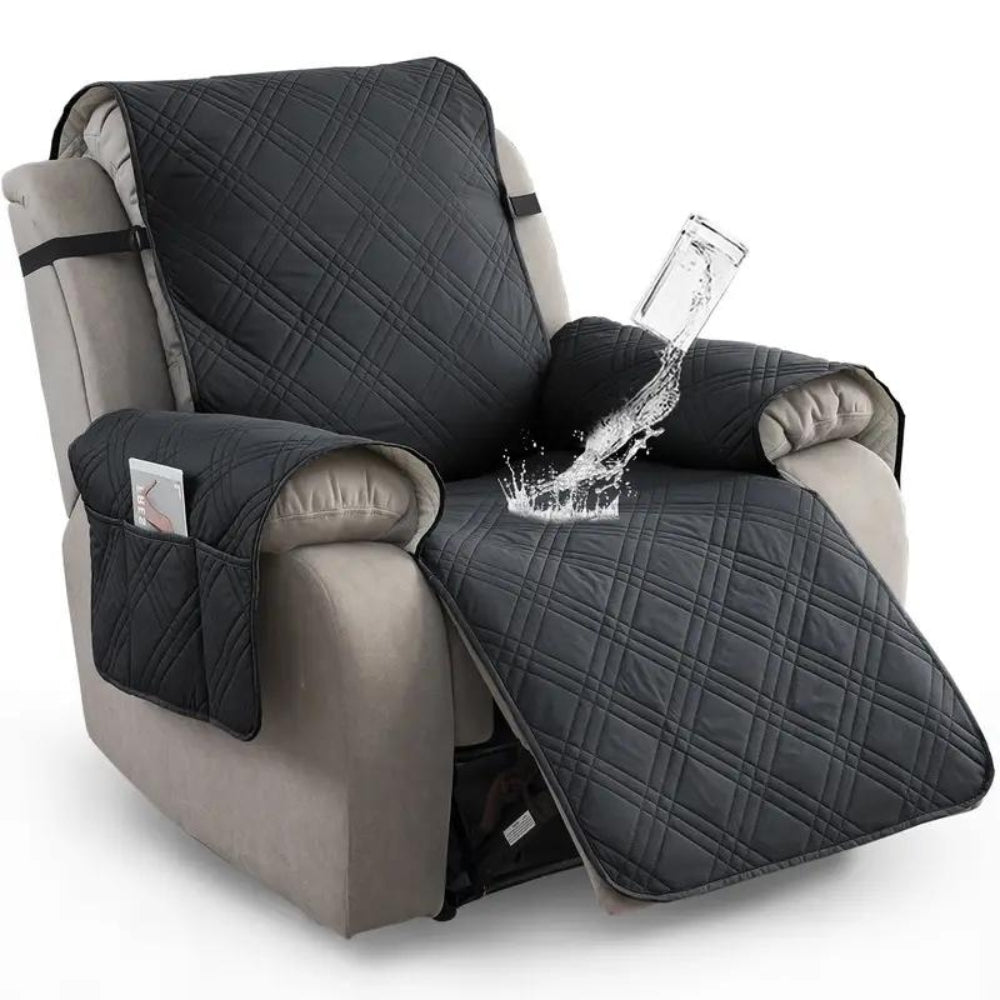 Navy blue quilted chair cover on a beige recliner with water being poured onto it.