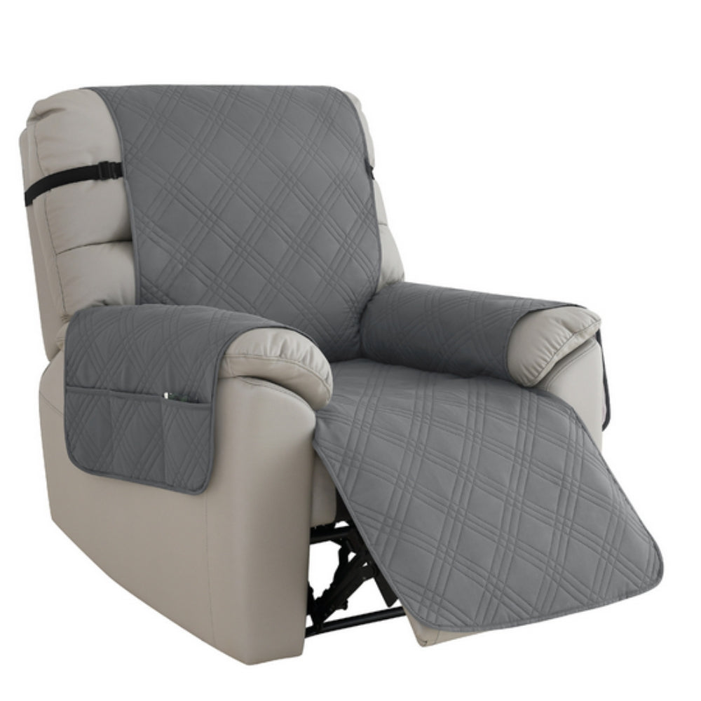 Gray recliner cover on a beige recliner chair with a white background