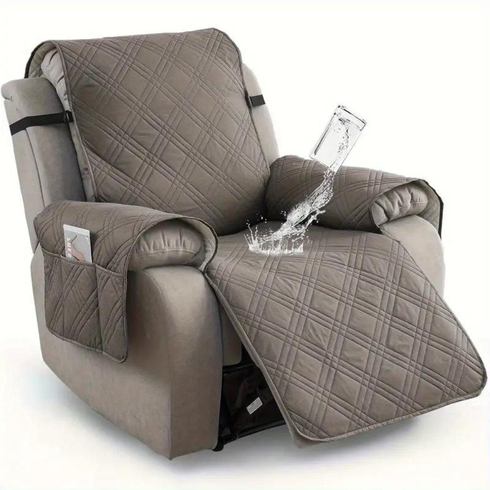 Gray quilted recliner cover with water spill simulation on a white background