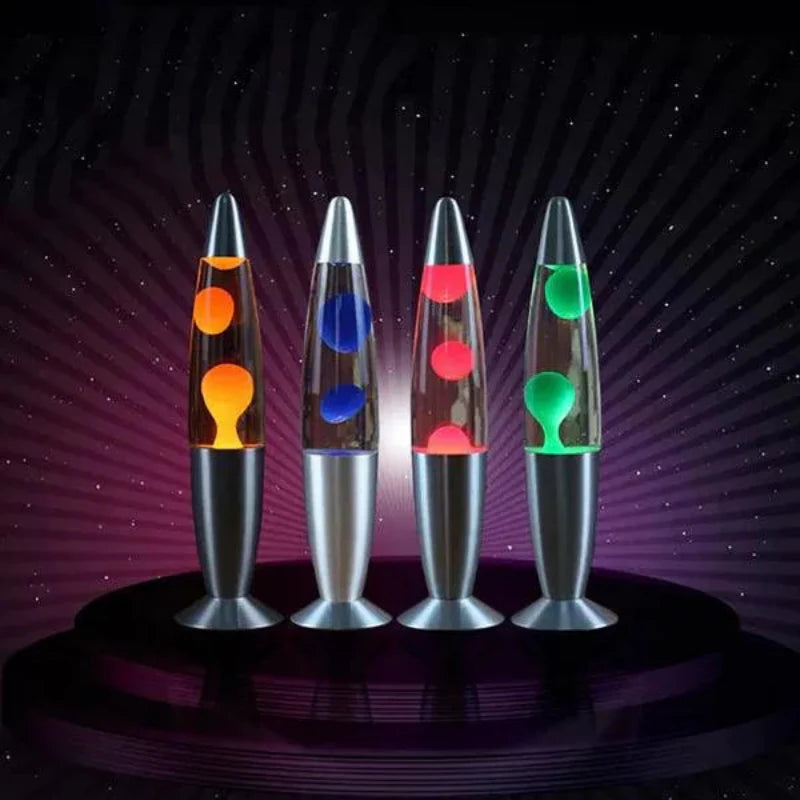 Four lava lamps with colorful liquid sections on a dark background