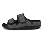 Gray sandal with black straps on a white background