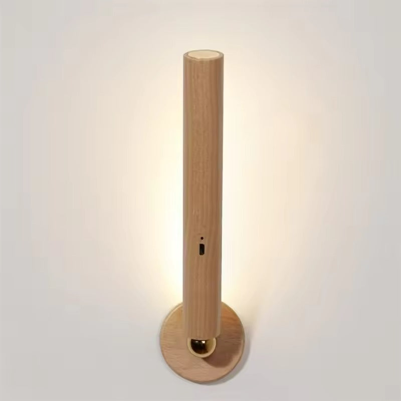 Wooden wall-mounted light fixture on a white background