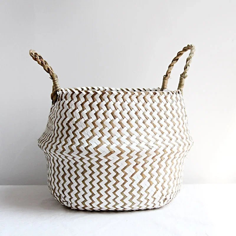 Woven basket with a zigzag pattern on a white background